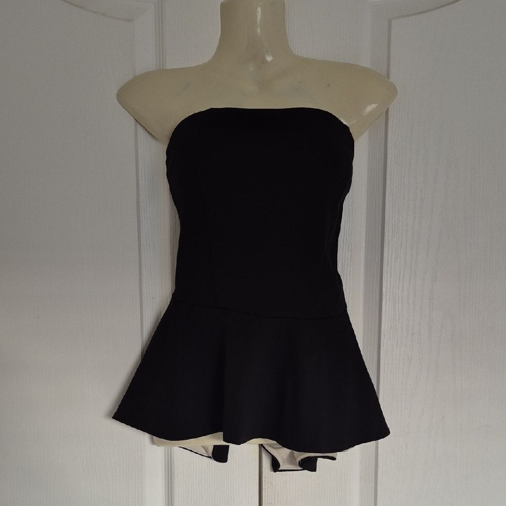 Ann Taylor Classic BlackโStrapless Peplum Top